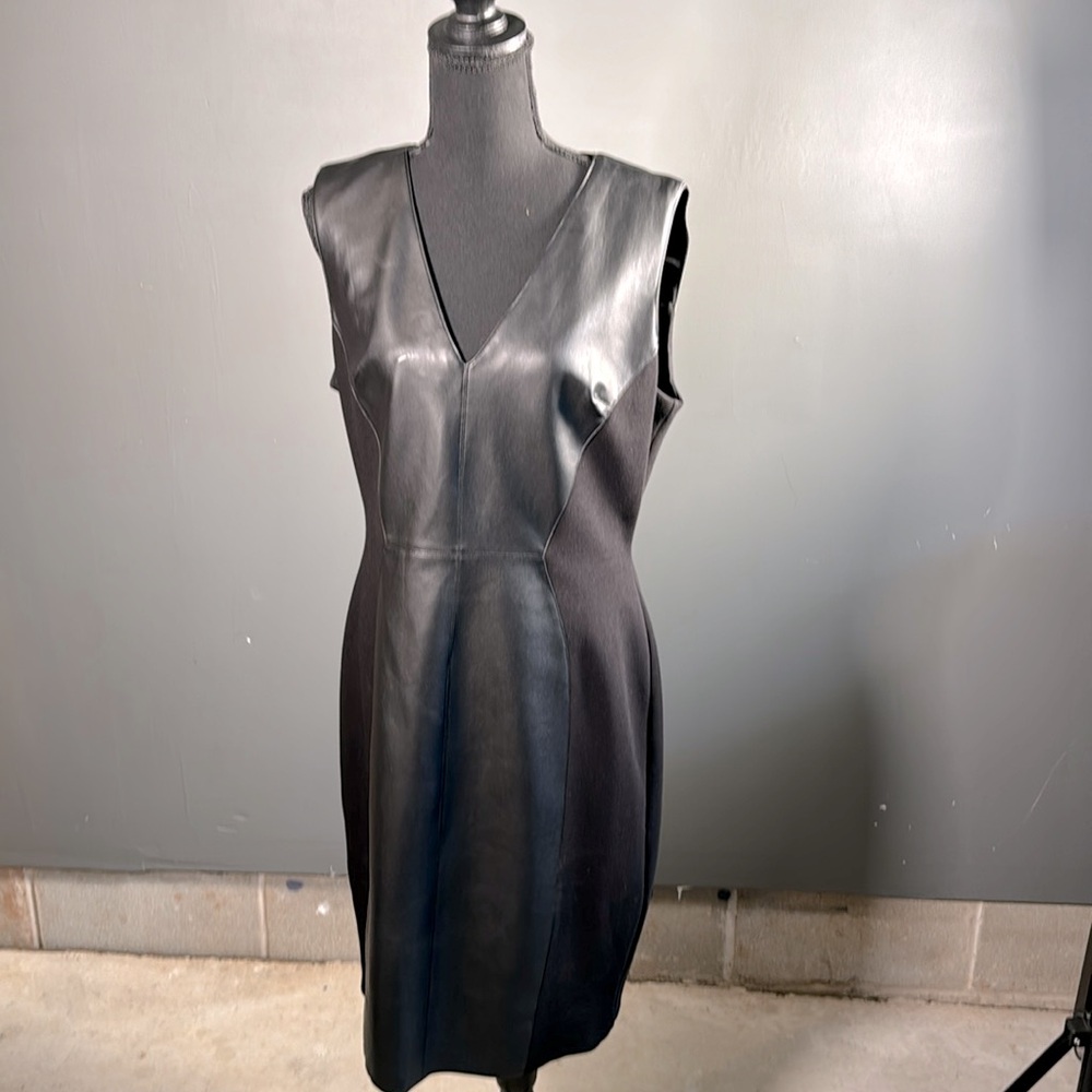 Faux leather in the front and the back neck dress.